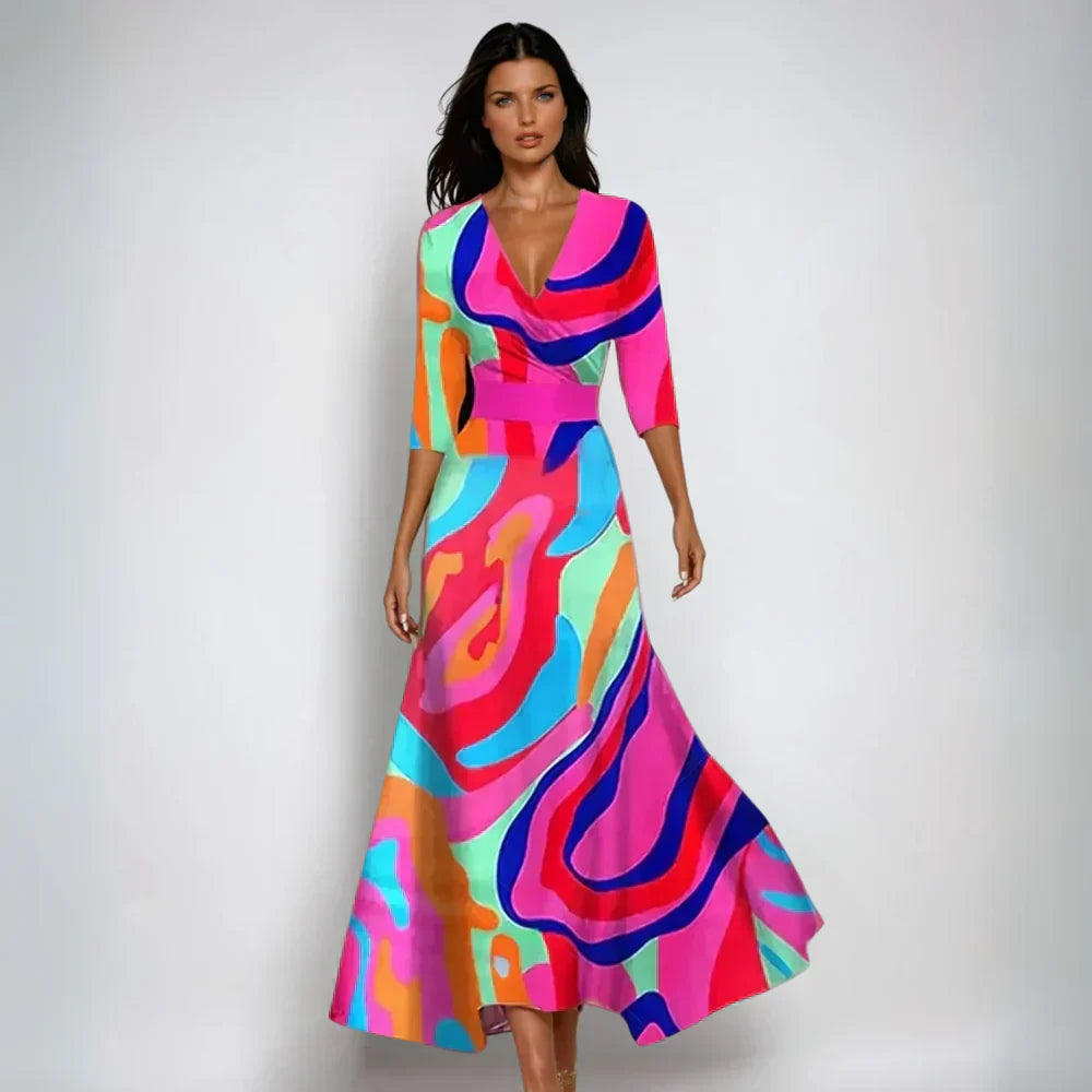 Colorful floral maxi dress with V neck, three quarter sleeves, and vibrant abstract print
