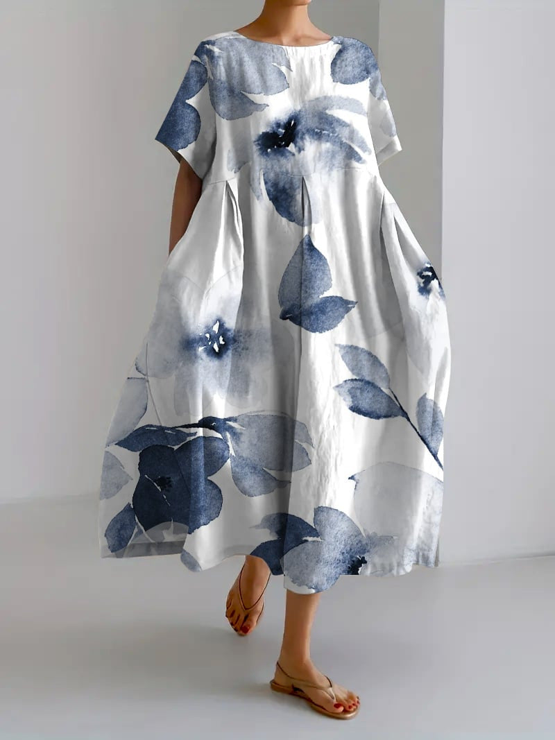 White midi dress with oversized blue floral print, breezy short sleeve summer dress