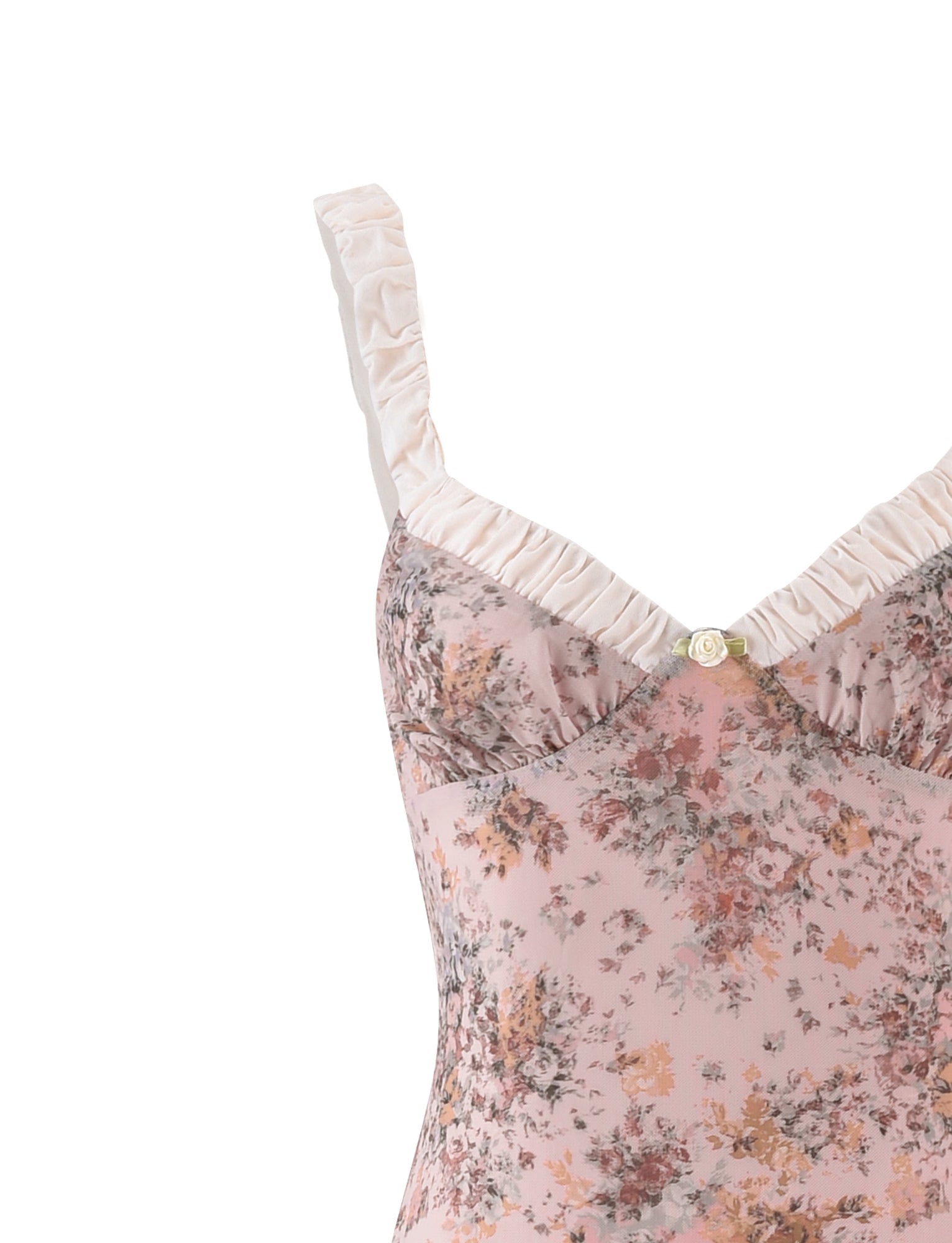 Close-up of the TIGERMIST AMARAN DRESS - PINK : CAMO FLORAL, a maxi dress in pink, peach, and gray with ruched cream straps and a decorative rose at the neckline, featuring a Pink Camo Floral print for a modern touch.