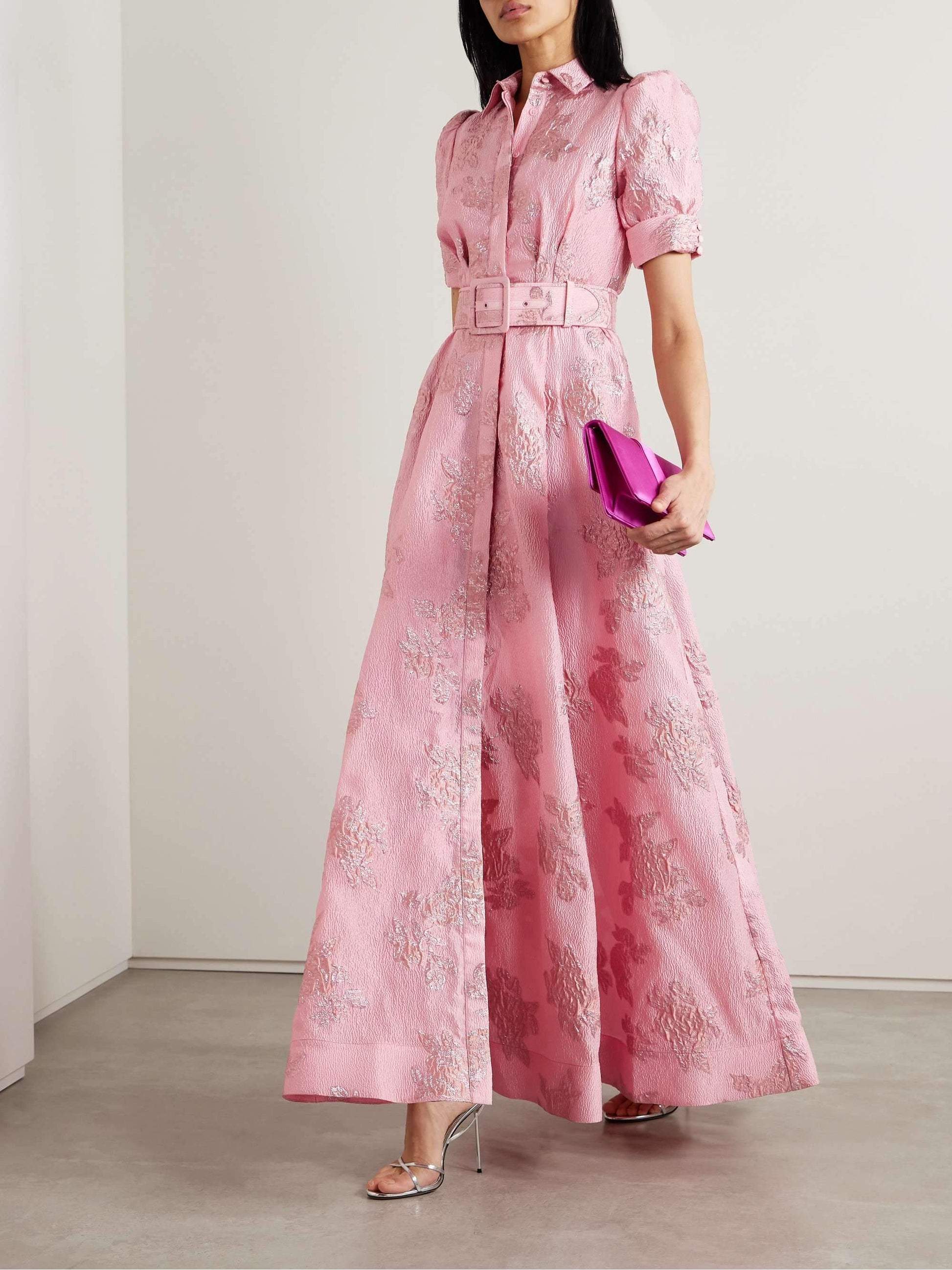 Pink floral maxi dress with puff sleeves, collared neckline, and wide belted waist