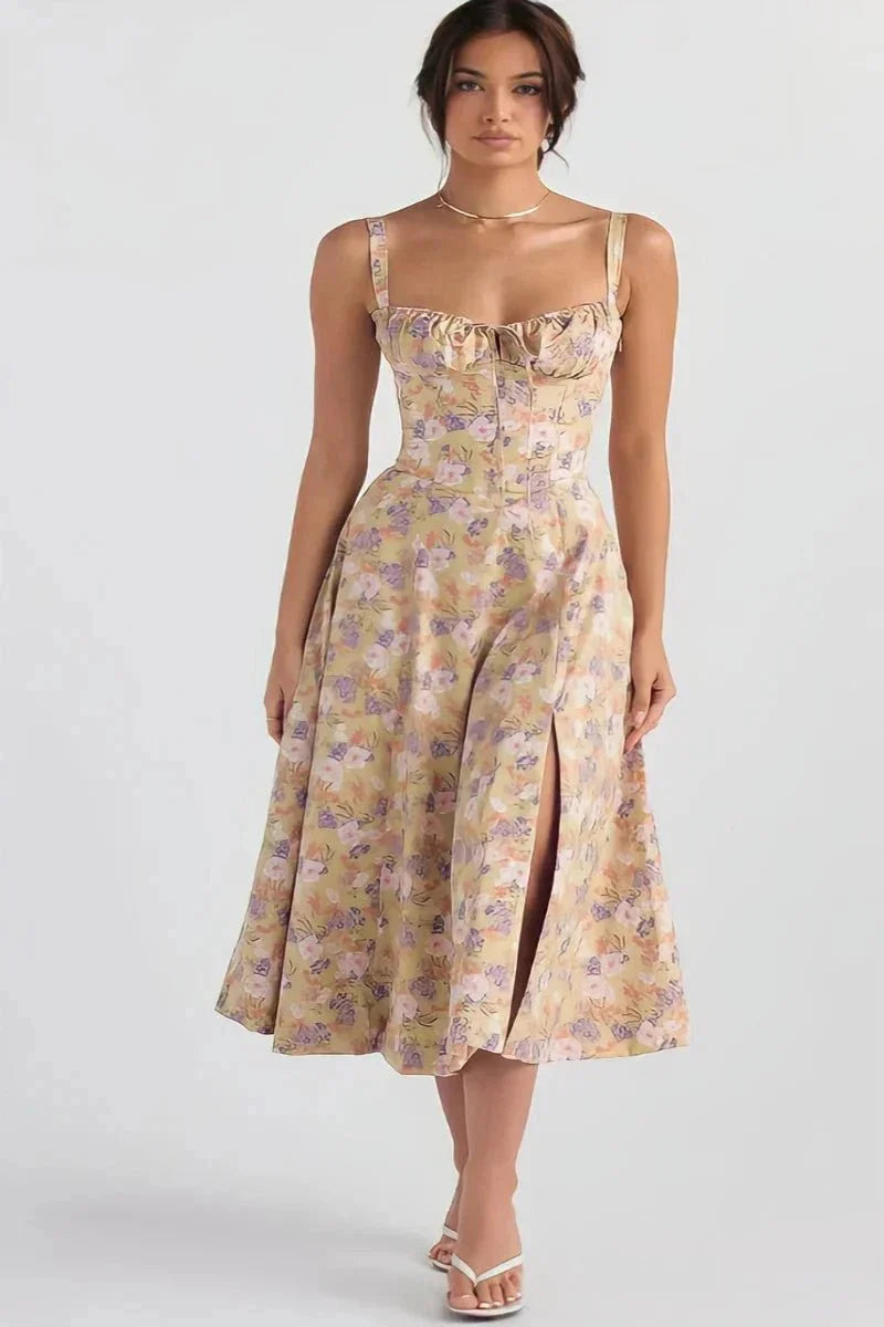 Yellow floral midi dress with square neckline, wide straps, and front slit for a summer dress style