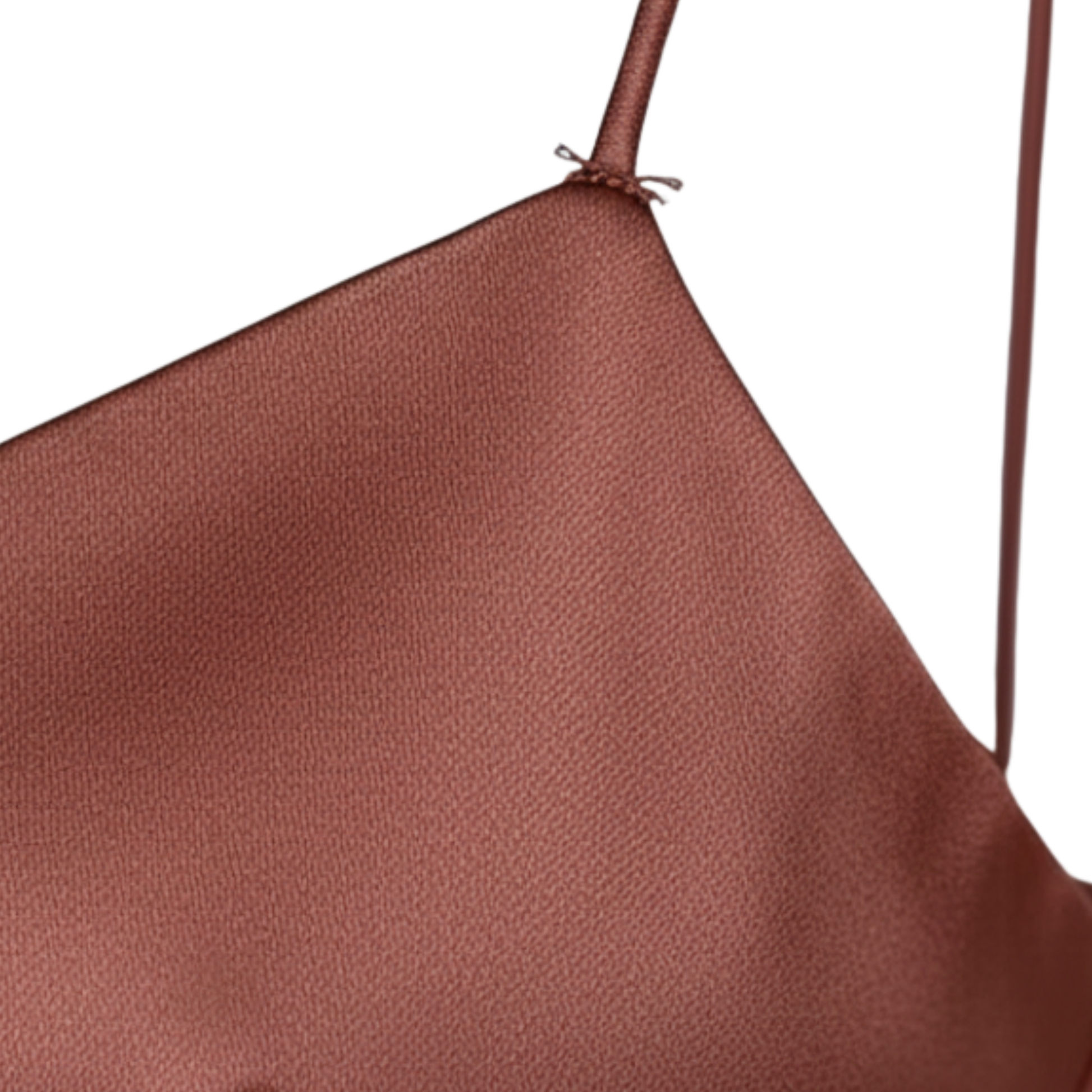 Back view of rust satin slip dress with crisscross spaghetti straps and open back