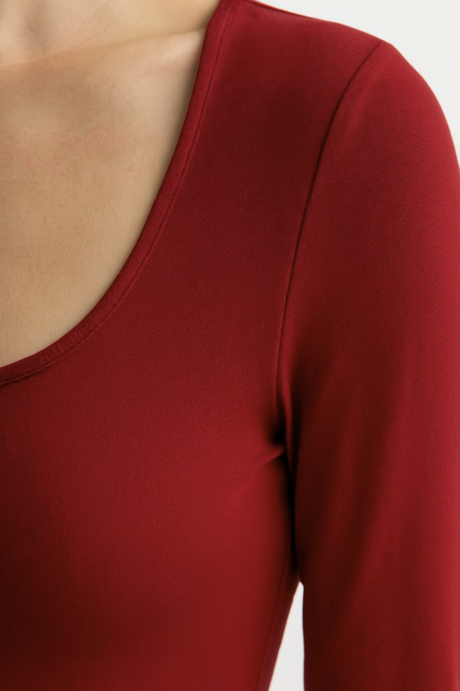 Red square neck long sleeve maxi dress with sleek fitted shape and floor-length skirt
