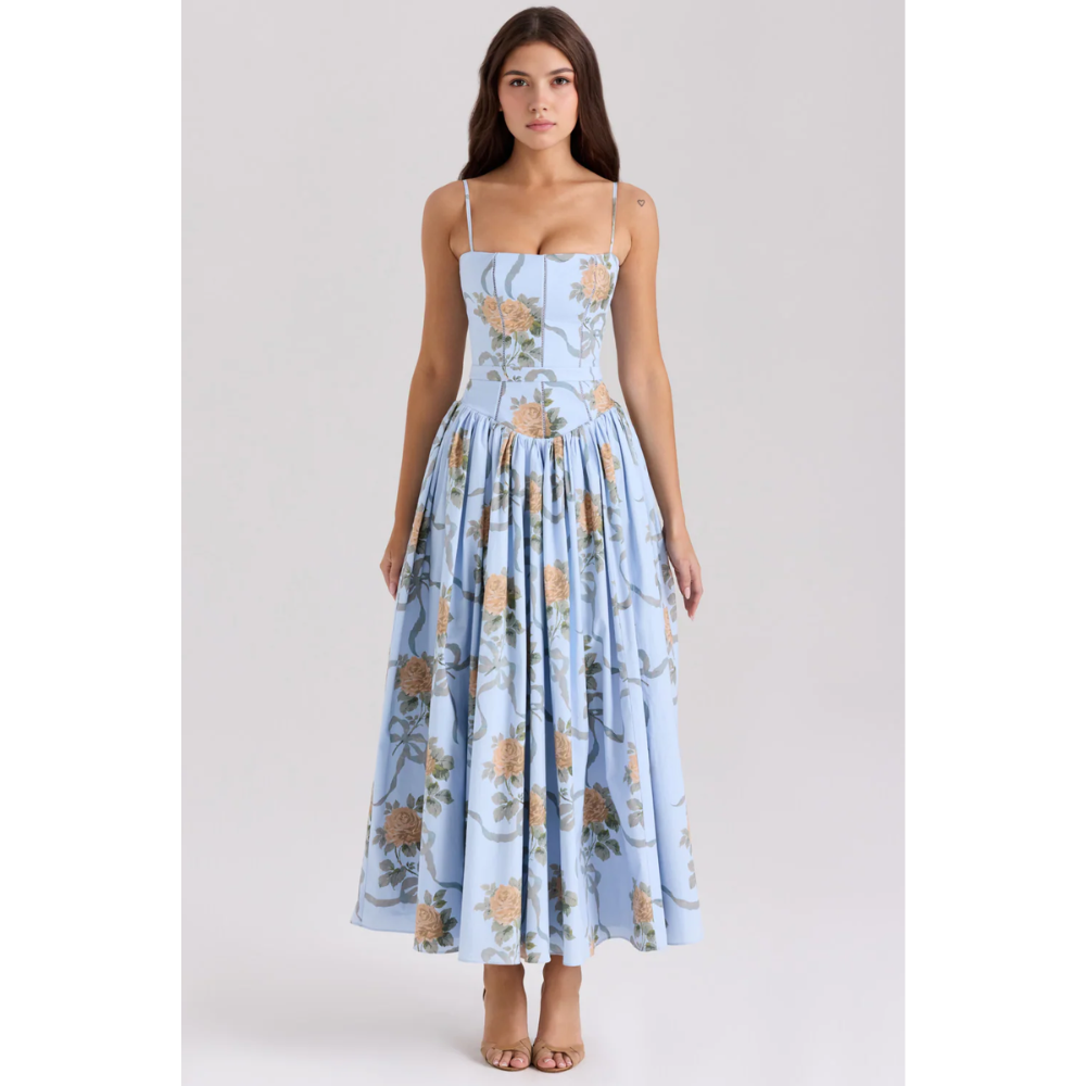 Women's light blue floral maxi dress with spaghetti straps, fitted bodice, and full skirt