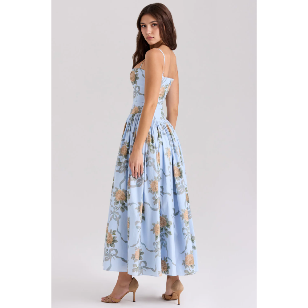 Back side view of light blue floral maxi dress with straps and full skirt