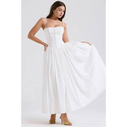 White summer maxi dress with square neckline and full skirt held out to the side