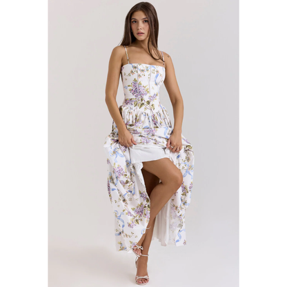 Women's floral maxi dress with square neckline, thin straps, and gathered skirt in white