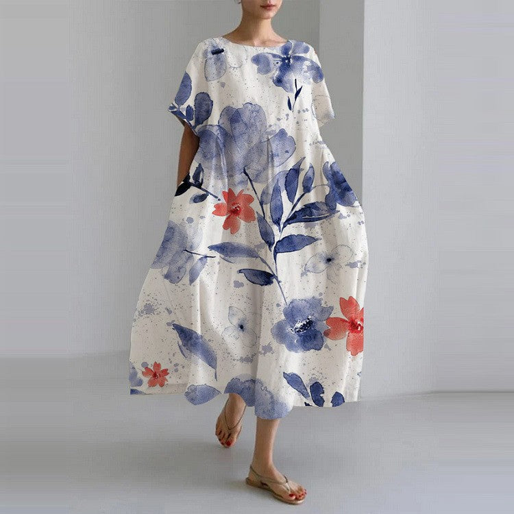 White midi dress with blue watercolor flowers and red accents, flowy summer dress