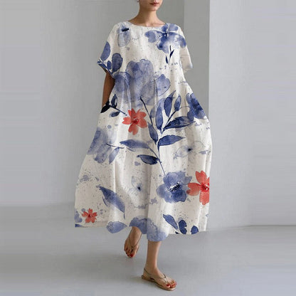 White midi dress with blue watercolor flowers and red accents, flowy summer dress