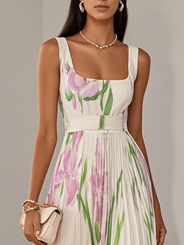 Close-up of floral sleeveless maxi dress with square neckline, waist band and pink flower print