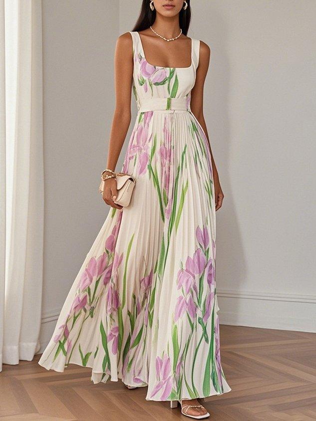 Full length women's sleeveless maxi dress with square neck, belted waist and flowing floral skirt