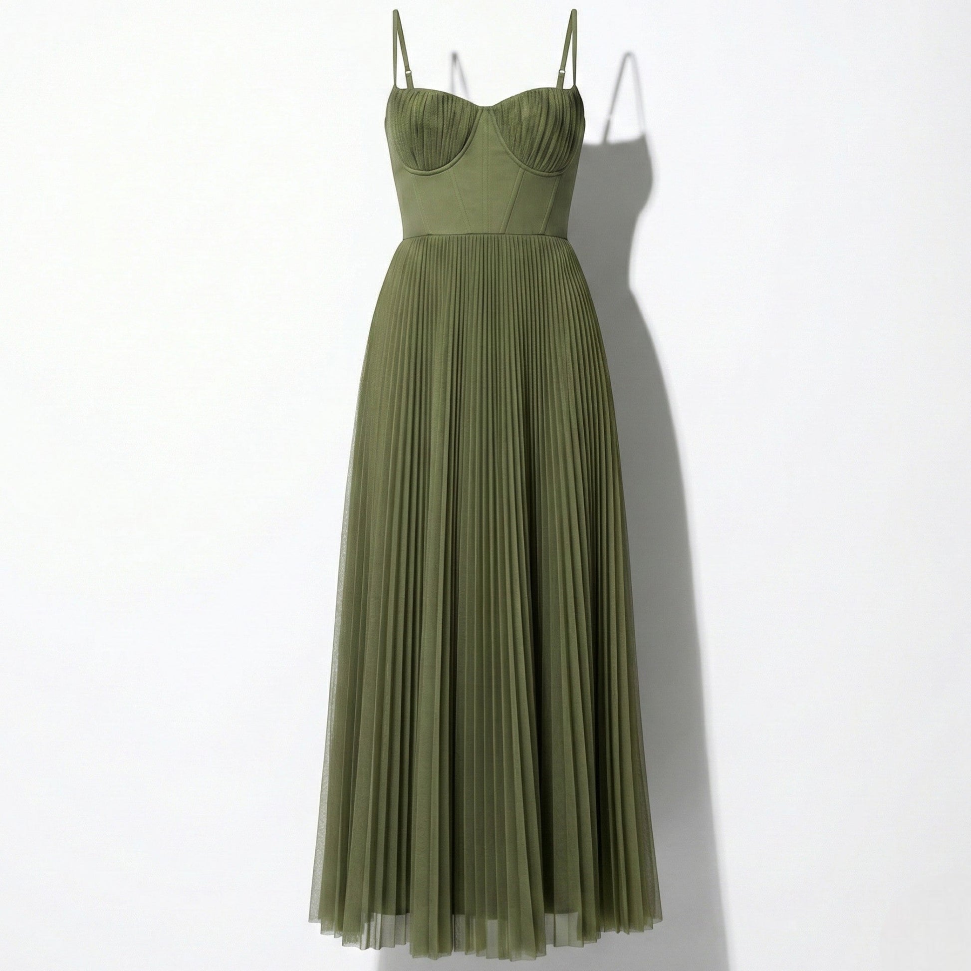 Olive green sleeveless midi dress shown full length with fitted bodice and flowing pleats
