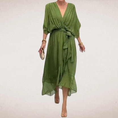 Green v neck midi wrap dress with short sleeves, belted waist, and flowy hem