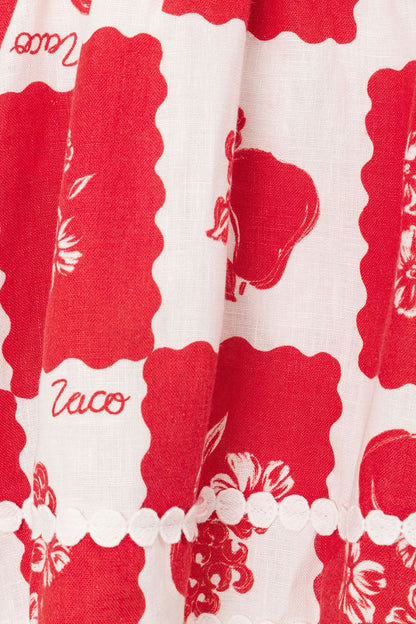 Back studio view of a floral mini dress with square back, zipper closure, and flared skirt