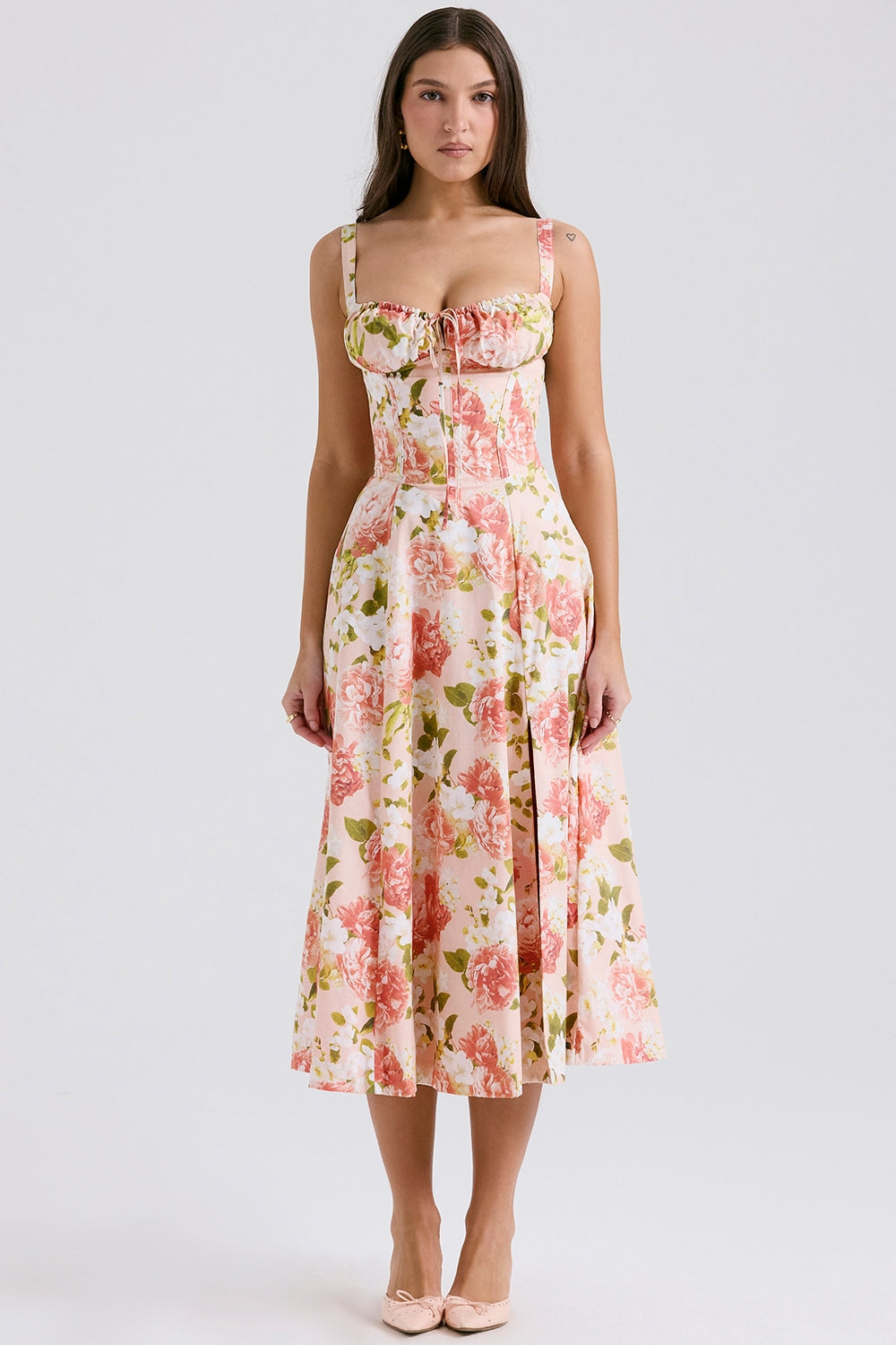 Back view of pink floral midi dress with square back, lace straps, and zipper closure