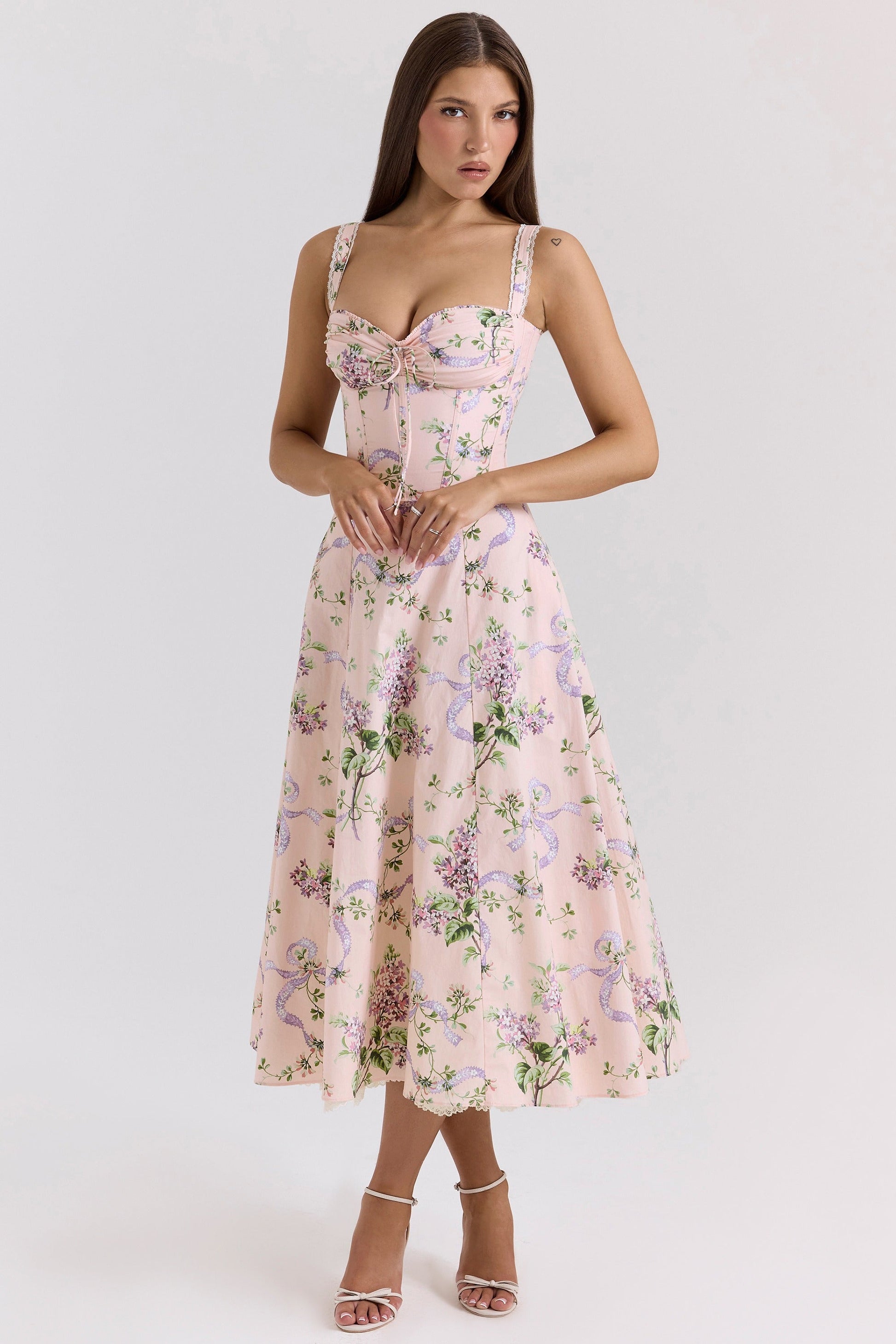 Back view of pink floral midi dress with square neckline straps and full skirt