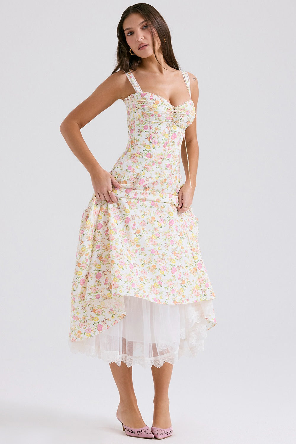 Floral midi dress with sweetheart top and layered tulle hem, styled as a wedding guest dress