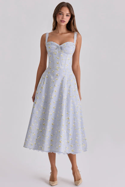 Side view of light blue floral midi dress with sweetheart neckline and corset seams