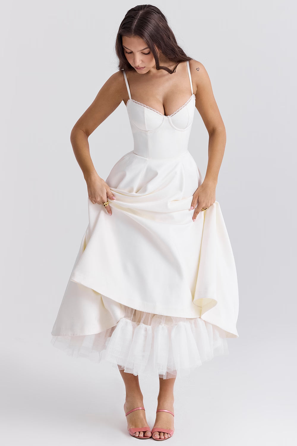 White midi dress with gathered skirt and tulle hem for wedding guest