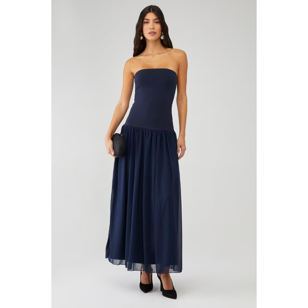 Navy strapless wedding guest maxi dress with fitted bodice and full sheer skirt