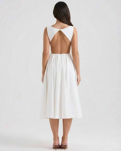Back view of white midi dress with open back cutout and sleeveless bodice